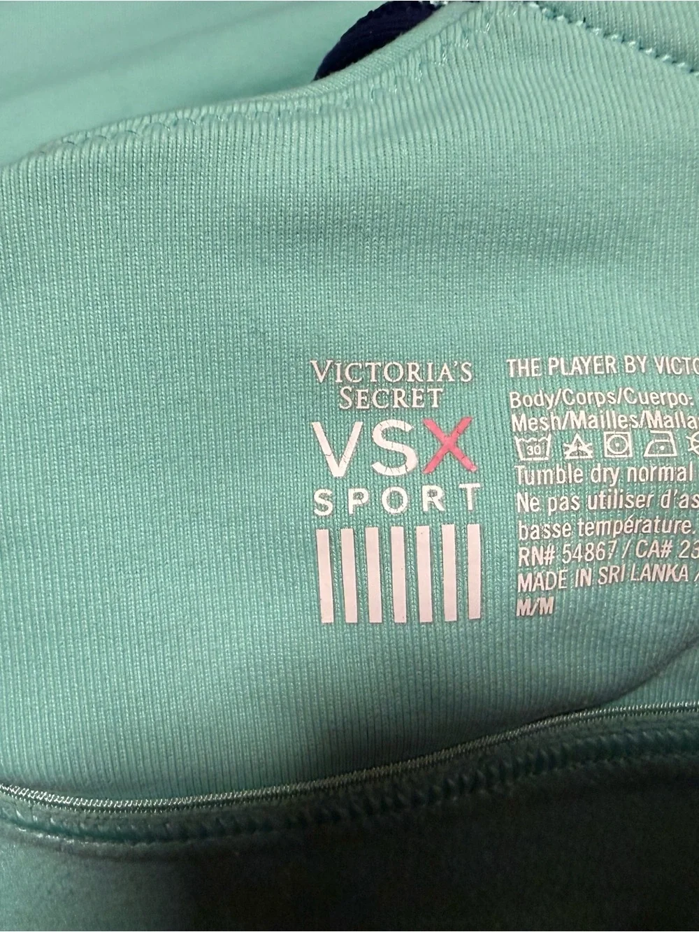 Victoria's Secret mint green sports bra with purple trim